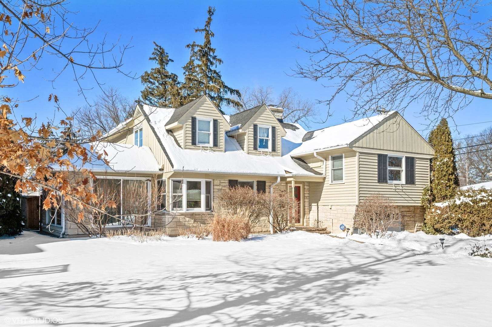 730 Forest Road Glenview, IL 60025 - Photo 2 of 37 a front view of a house with a wooden house