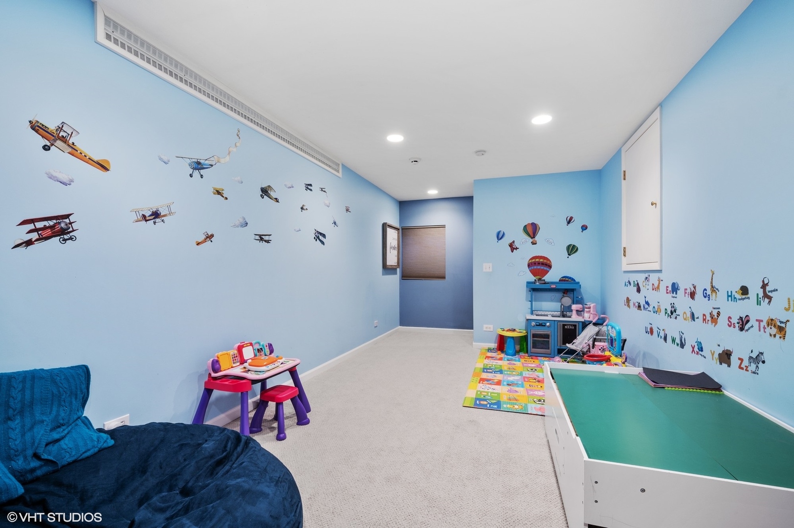 730 Forest Road Glenview, IL 60025 - Photo 26 of 37 a bedroom with toys and a wooden floor