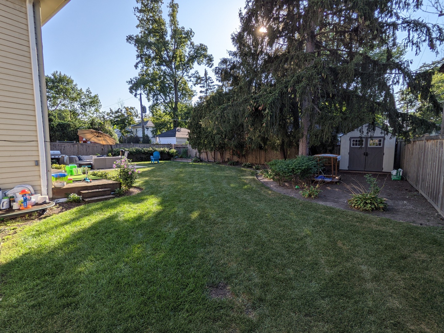 730 Forest Road Glenview, IL 60025 - Photo 30 of 37 a view of backyard with a garden and outdoor seating