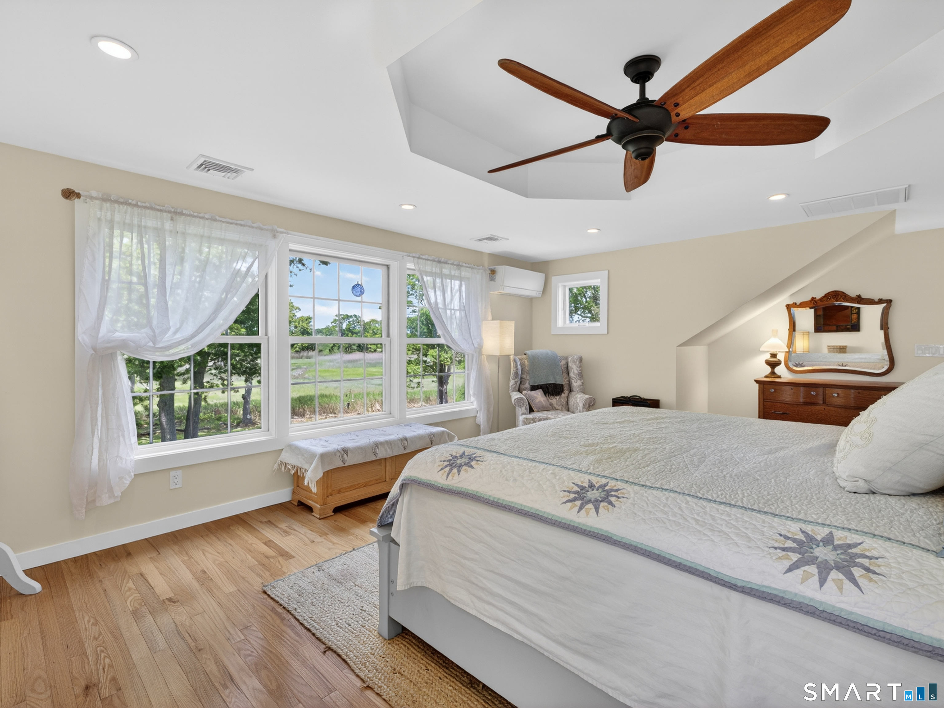 82 Pratt Road Clinton, CT 06413 - Photo 24 of 40 Coffered ceiling with ceiling fan and great views of creek.