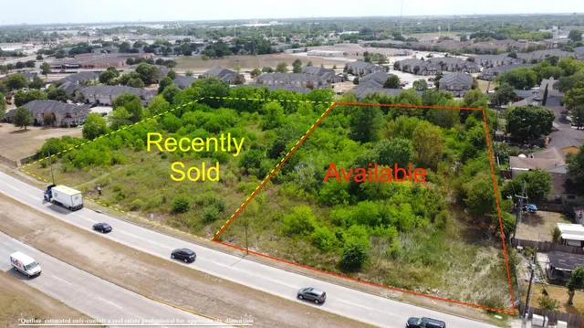 an aerial view of a houses with outdoor space