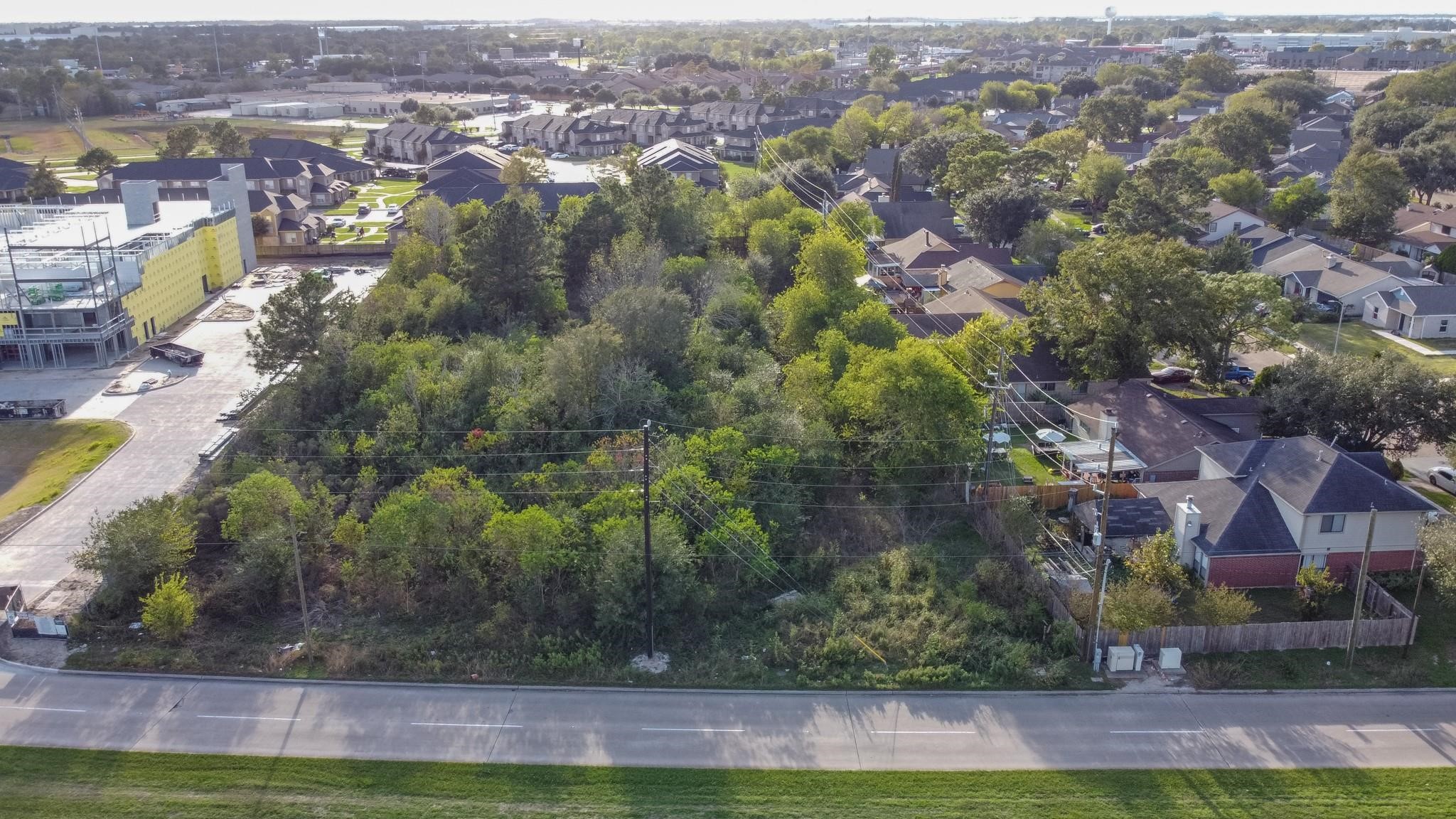 10307 Bammel North Houston Road Houston, TX 77086 - Photo 5 of 15 an aerial view of residential houses with outdoor space and trees