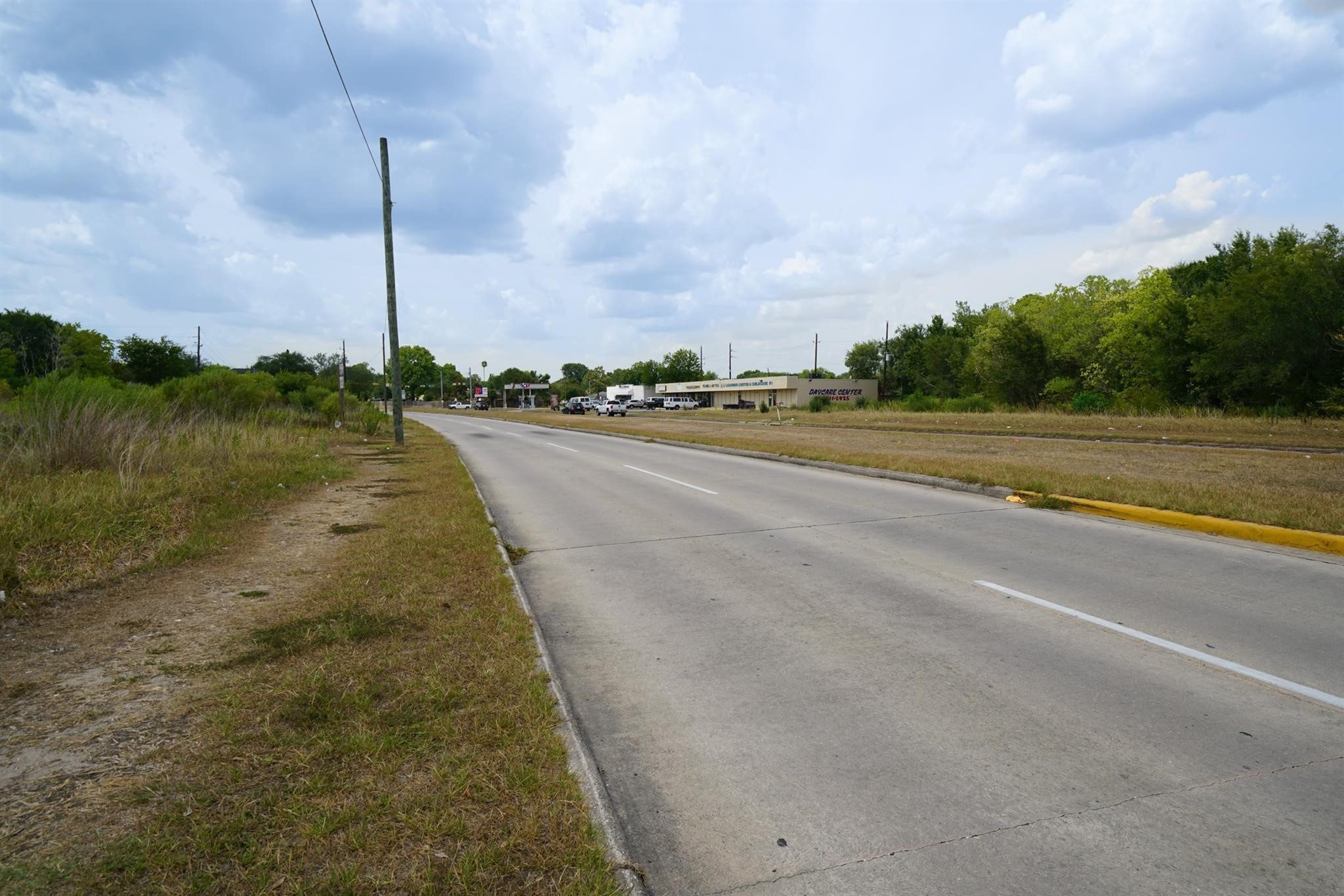 10307 Bammel North Houston Road Houston, TX 77086 - Photo 10 of 15 a view of a city street with a large building
