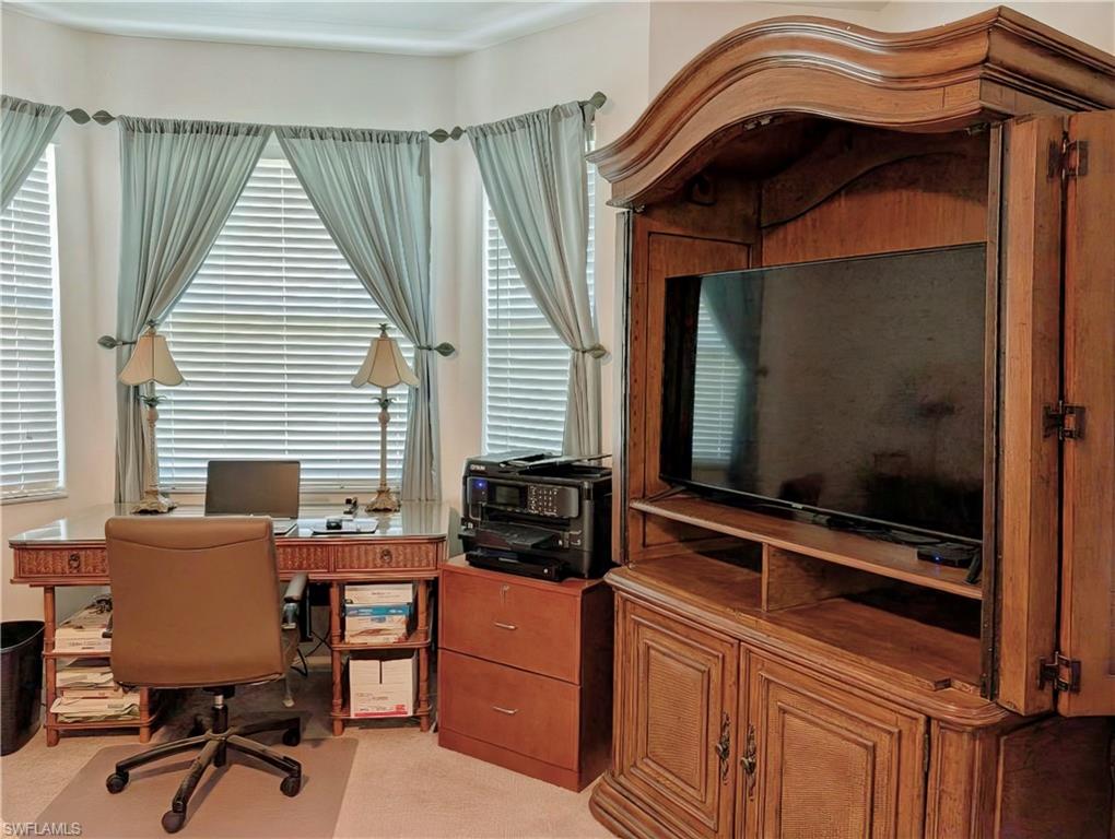 5758 Lago Villaggio Way Naples, FL 34104 - Photo 28 of 42 Home office with carpet flooring and a healthy amount of sunlight
