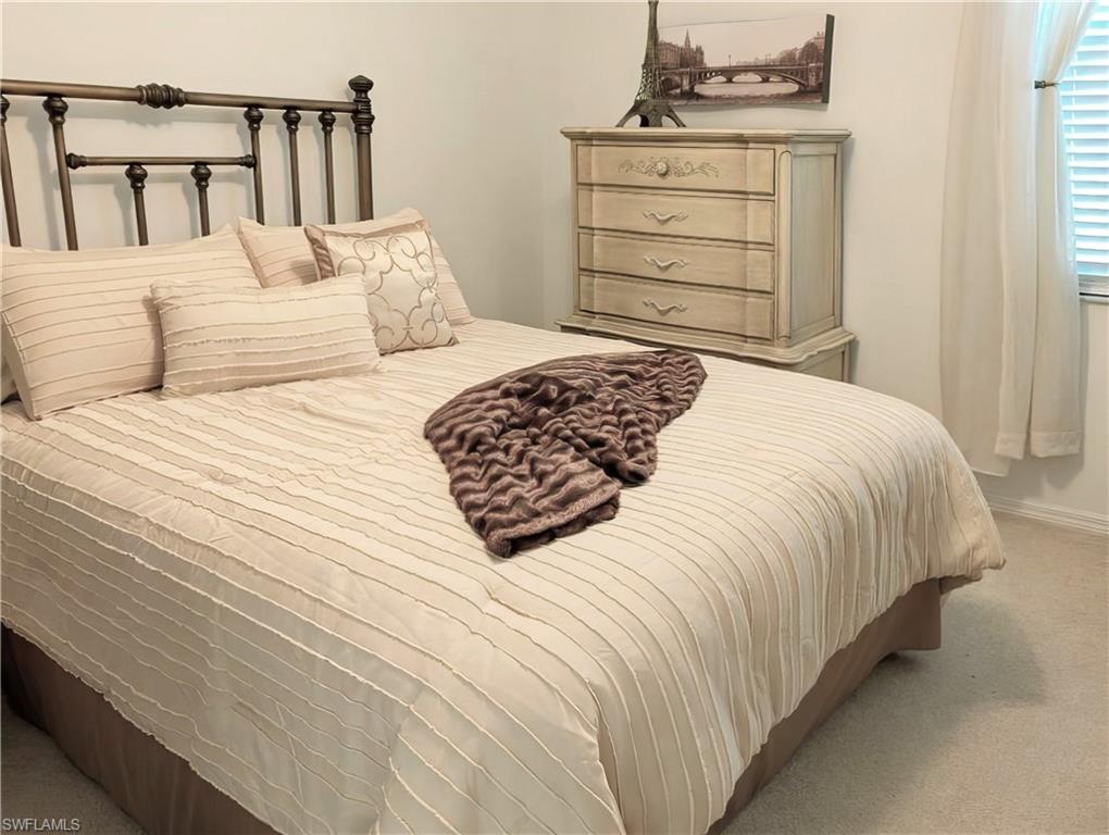 5758 Lago Villaggio Way Naples, FL 34104 - Photo 34 of 42 View of Guest Bedroom with country french accents