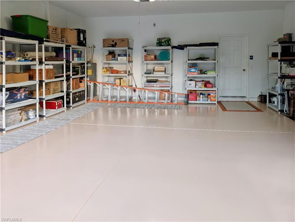 5758 Lago Villaggio Way Naples, FL 34104 - Photo 41 of 42 Garage, interior view
