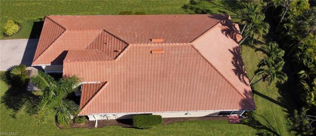 5758 Lago Villaggio Way Naples, FL 34104 - Photo 5 of 42 Drone / aerial view