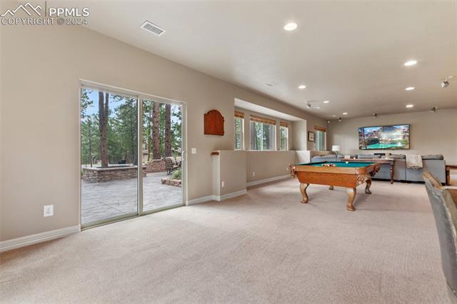 7880 Monarch Road Larkspur, CO 80118 - Photo 24 of 25 Recreation room featuring light carpet and pool table