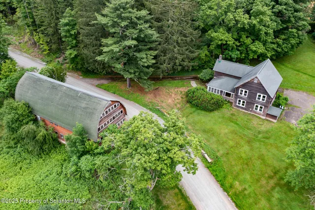 a view of a back yard of a house