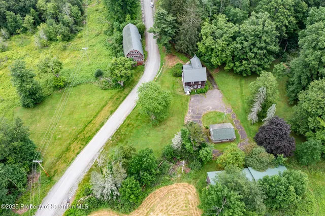 a view of a lake with a yard