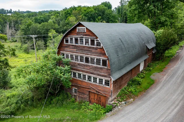 a aerial view of a house with balcony