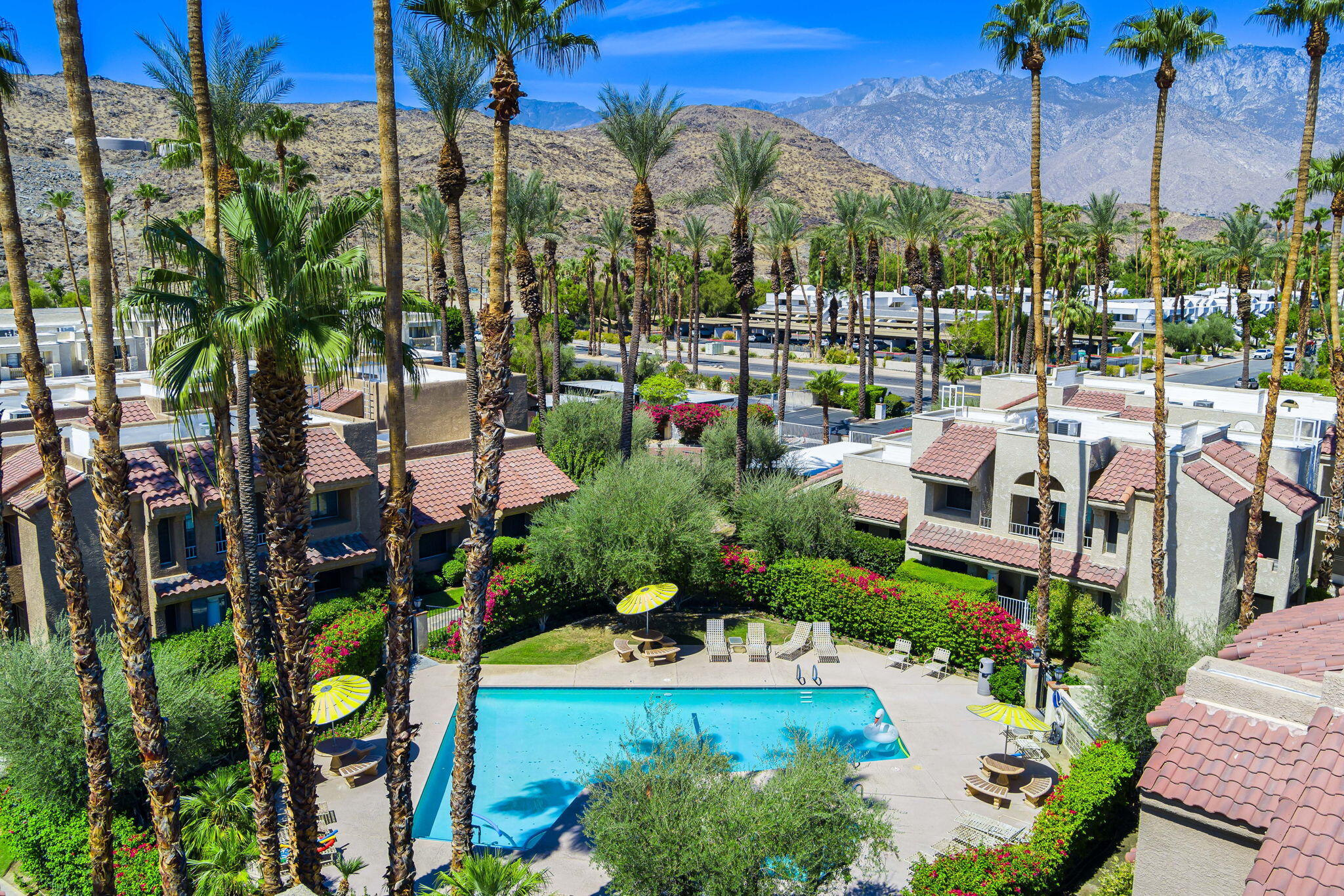 2700 Lawrence Crossley Road, Unit 120 Palm Springs, CA 92264 - Photo 1 of 20 a view of yard and swimming pool