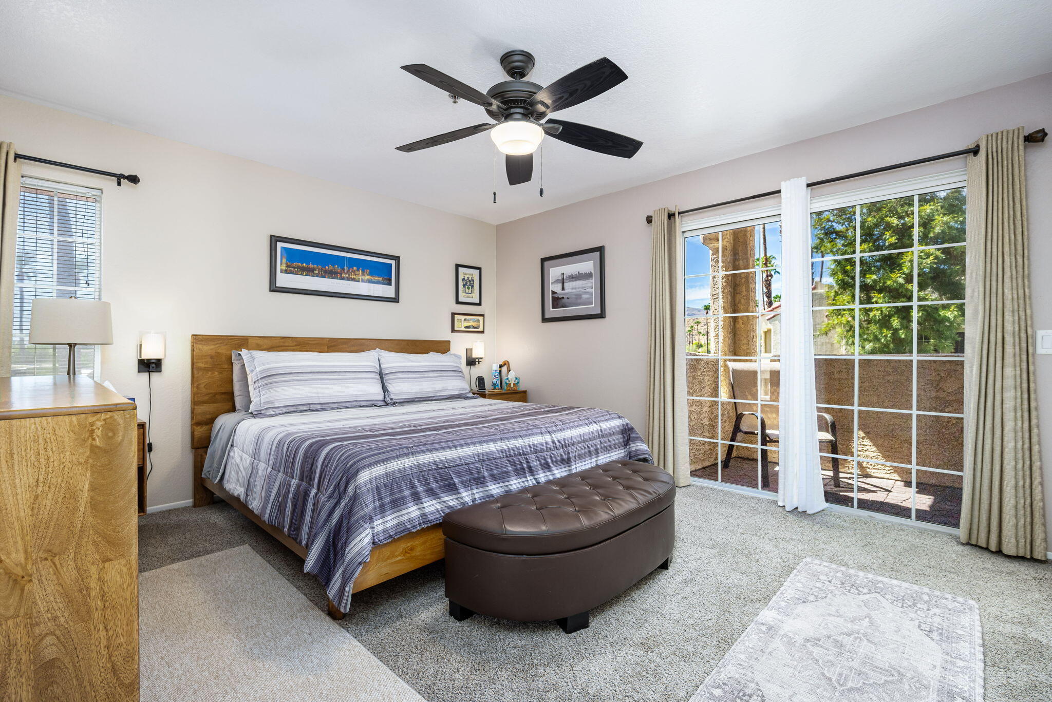 2700 Lawrence Crossley Road, Unit 120 Palm Springs, CA 92264 - Photo 13 of 20 a bedroom with a bed and window
