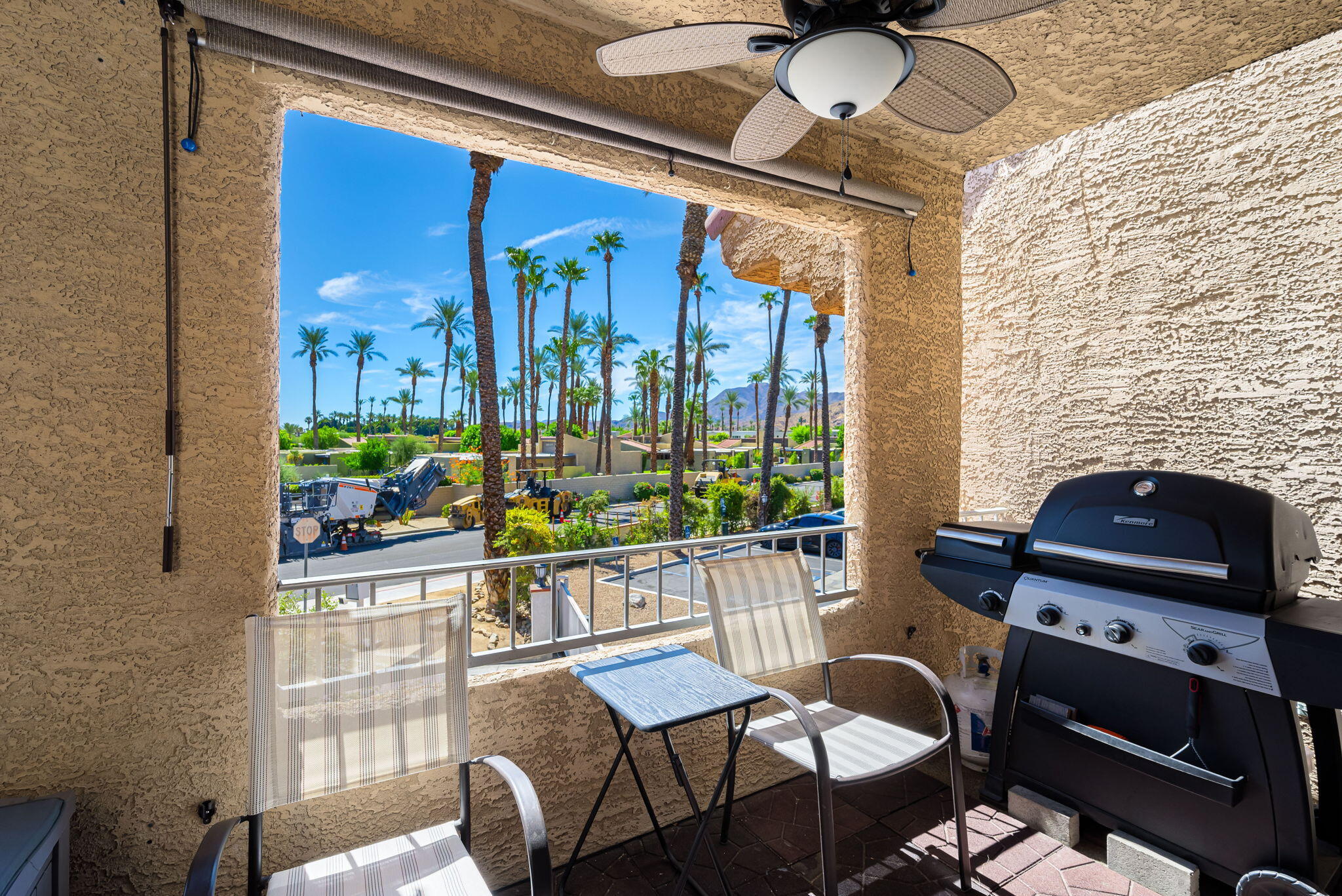 2700 Lawrence Crossley Road, Unit 120 Palm Springs, CA 92264 - Photo 19 of 20 a view of a balcony with furniture and a potted plant