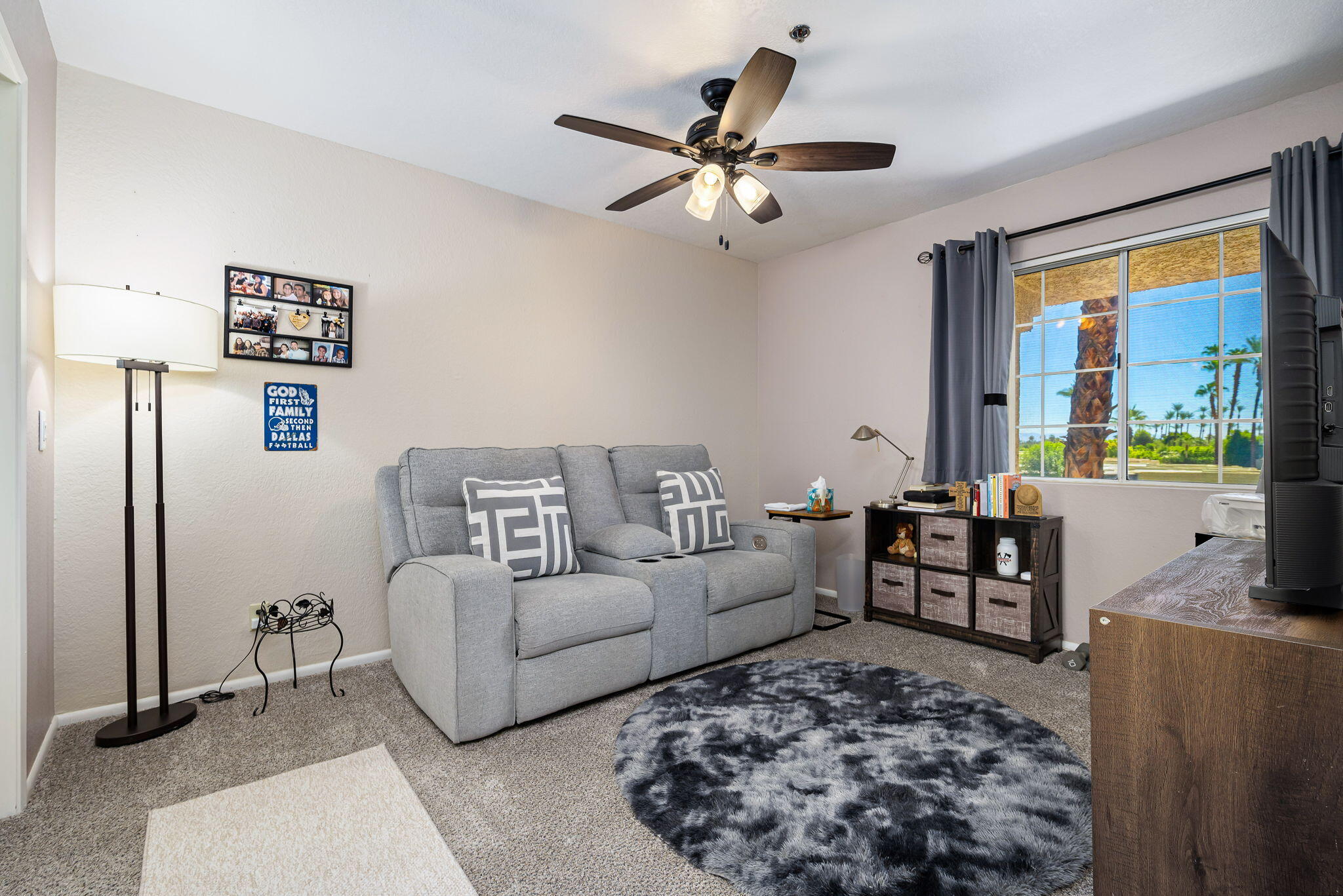 2700 Lawrence Crossley Road, Unit 120 Palm Springs, CA 92264 - Photo 7 of 20 a living room with furniture and a flat screen tv