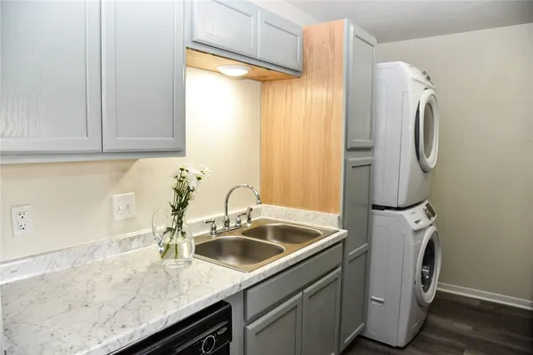 a bathroom with a sink a vanity and a mirror