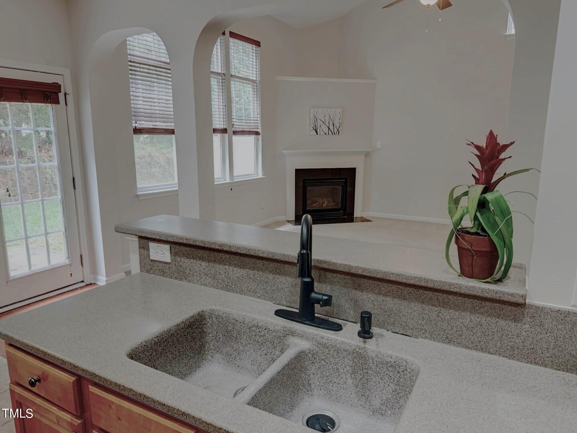 7608 Morrell Lane Durham, NC 27713 - Photo 12 of 34 a kitchen with sink and a window