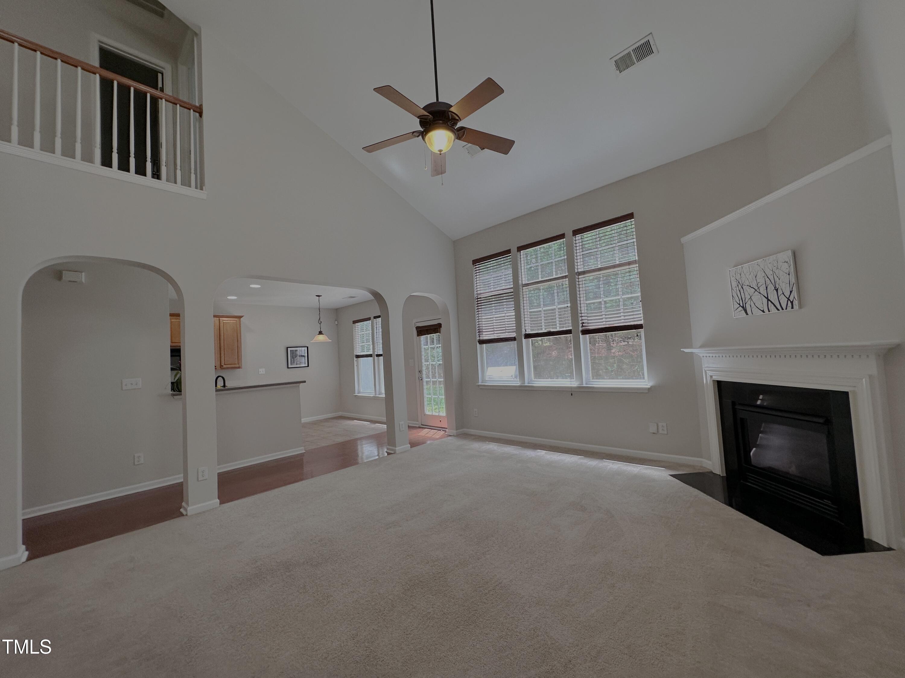 7608 Morrell Lane Durham, NC 27713 - Photo 13 of 34 a living room with furniture and a fireplace