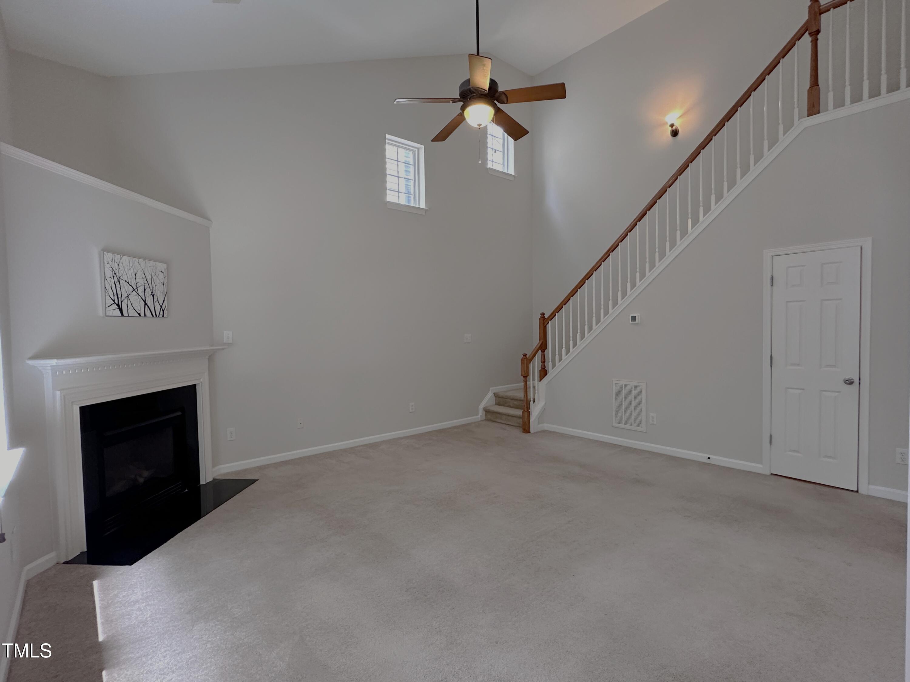 7608 Morrell Lane Durham, NC 27713 - Photo 16 of 34 a view of empty room with fireplace