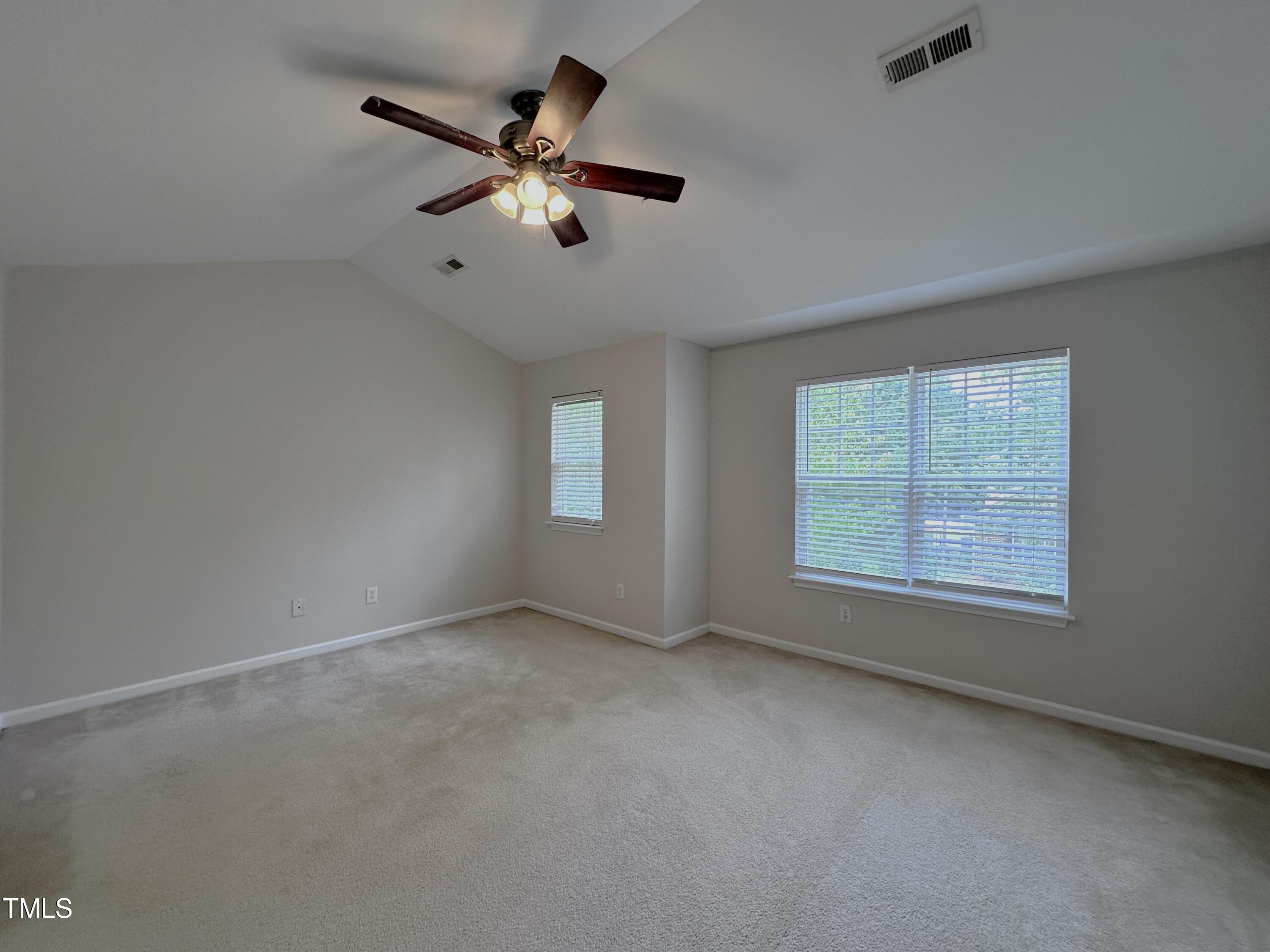 7608 Morrell Lane Durham, NC 27713 - Photo 20 of 34 a view of an empty room with a window