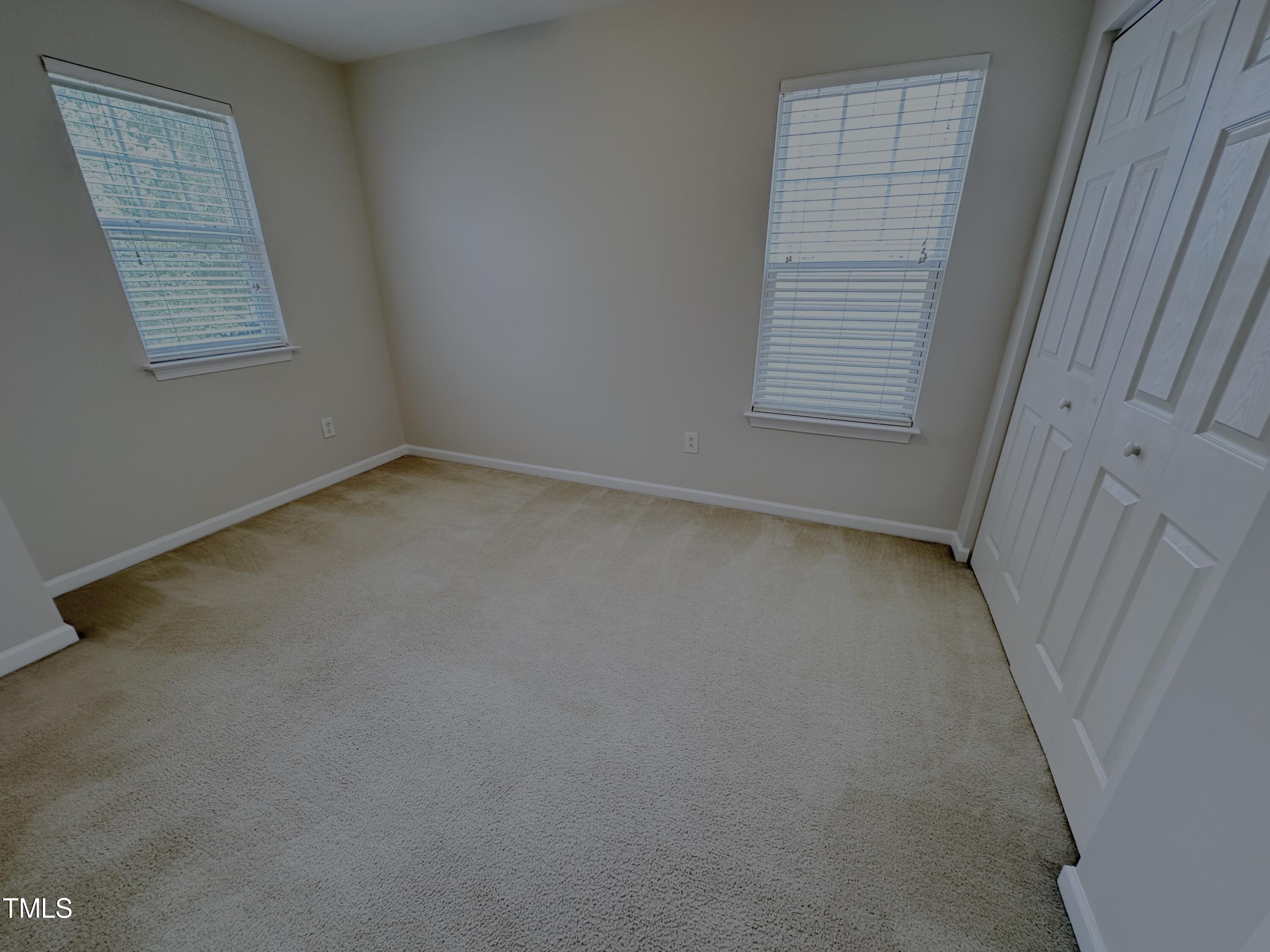 7608 Morrell Lane Durham, NC 27713 - Photo 26 of 34 an empty room with windows