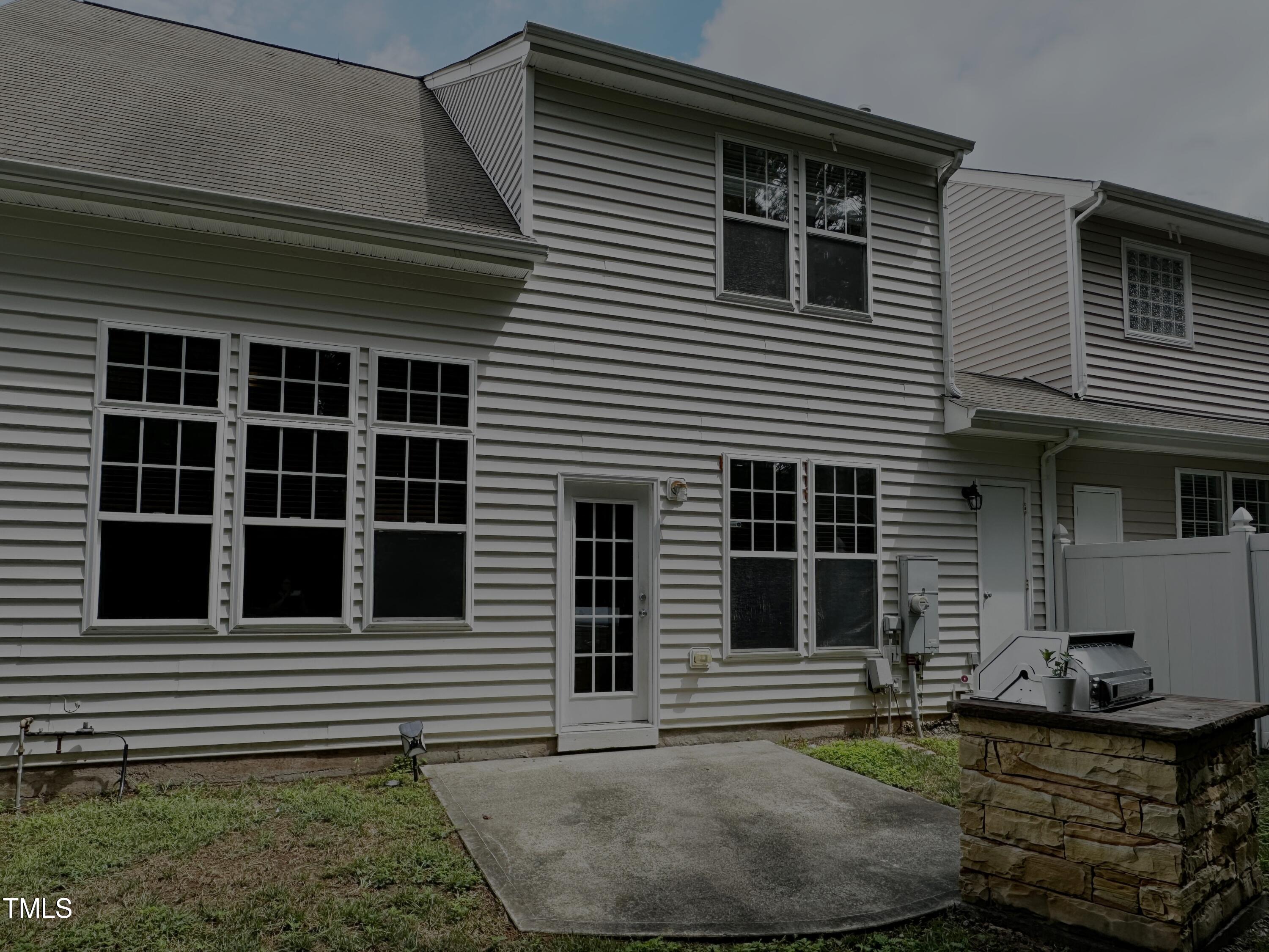7608 Morrell Lane Durham, NC 27713 - Photo 28 of 34 a backyard of a house with barbeque oven