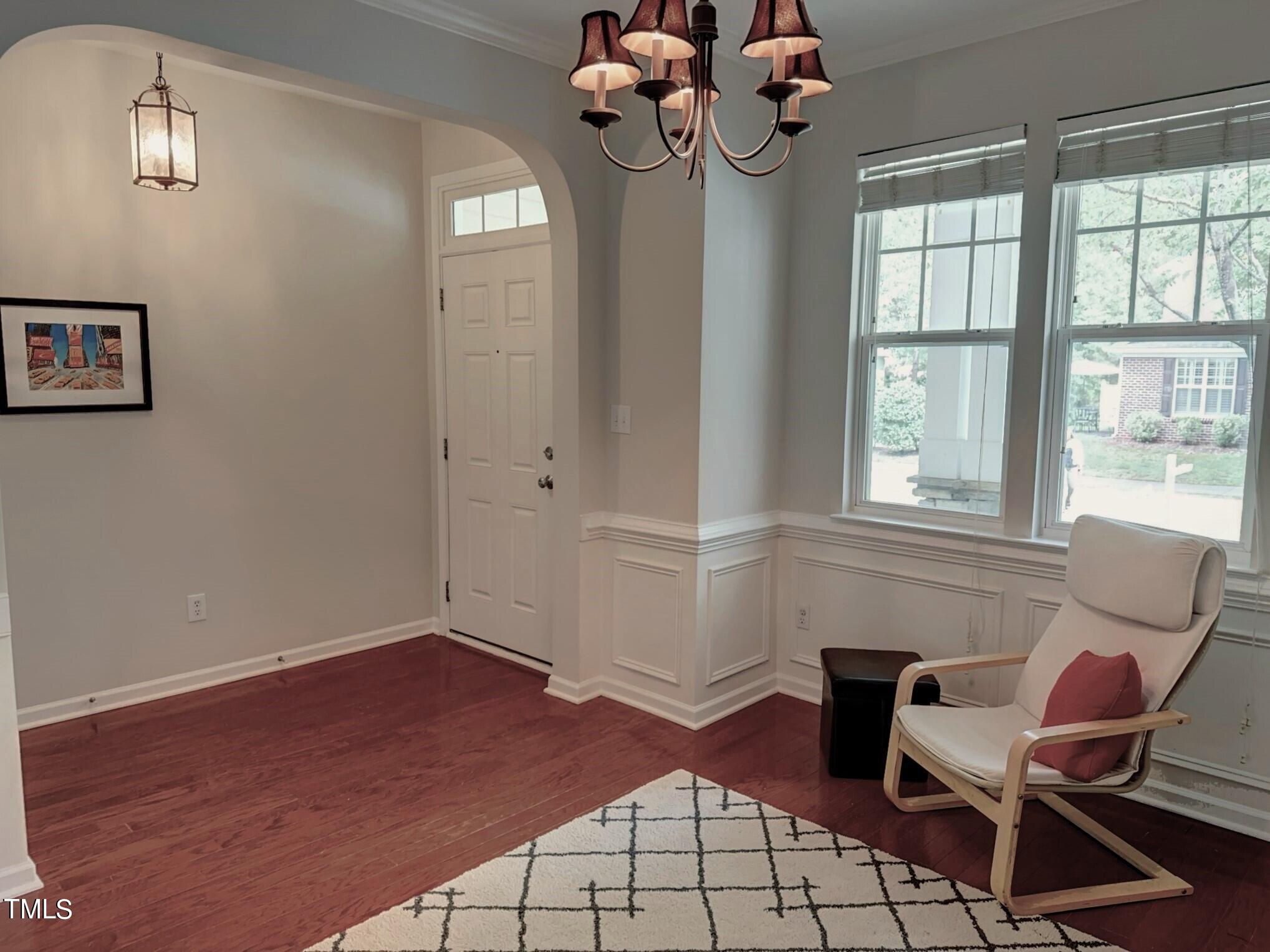 7608 Morrell Lane Durham, NC 27713 - Photo 5 of 34 a view of a dining room with furniture and chandelier