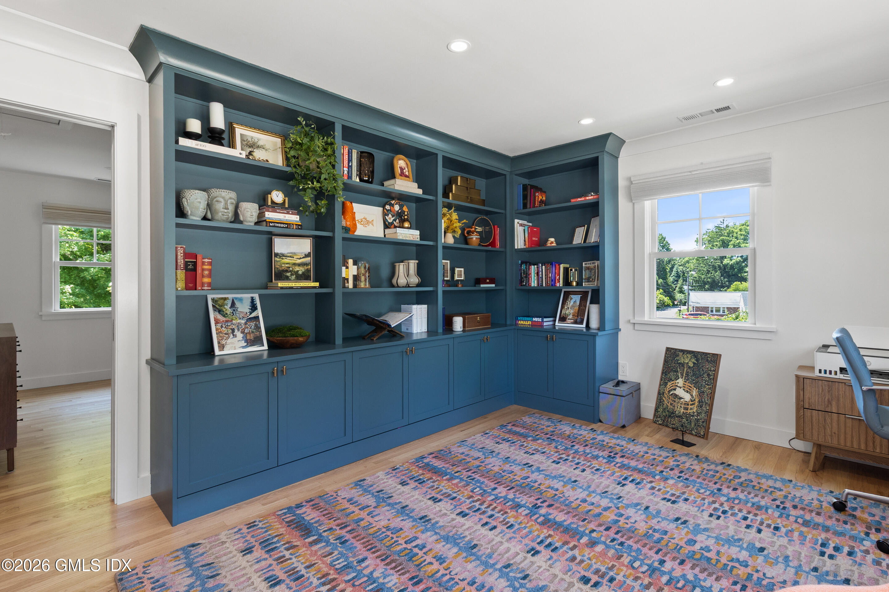 9 Deluca Drive Cos Cob, CT 06807 - Photo 12 of 30 a room with wooden floor and furniture