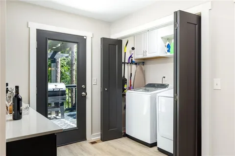 a view of kitchen and utility room