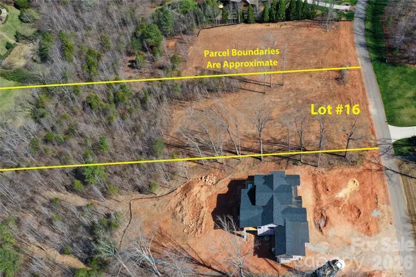 a view of swimming pool with outdoor seating and yard in the back