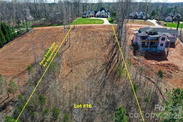 a view of a backyard with sitting area