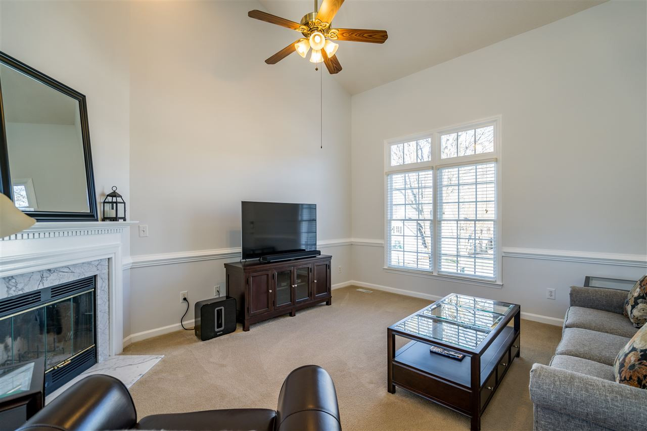 5221 Denmead Way Raleigh, NC 27613 - Photo 6 of 28 Vaulted ceilings, natural light, ceiling fan and open plan! Living Room