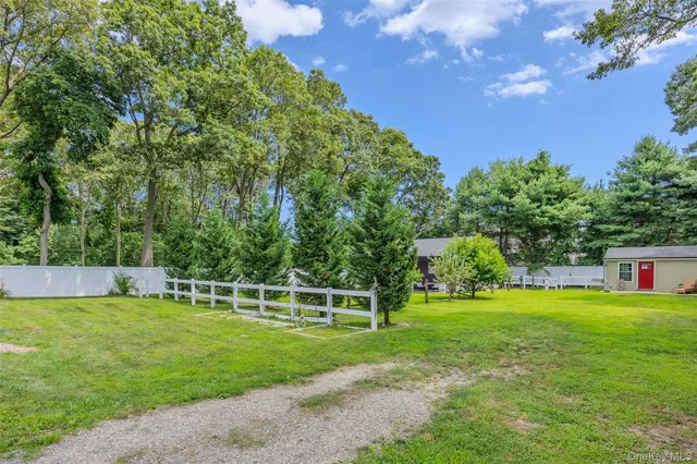 a view of a house with a big yard