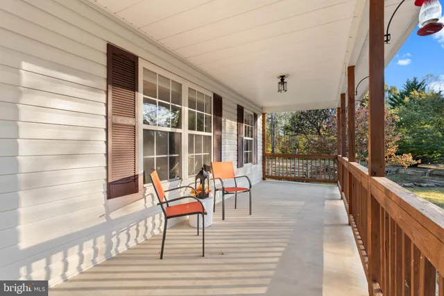 a backyard of a house with seating space