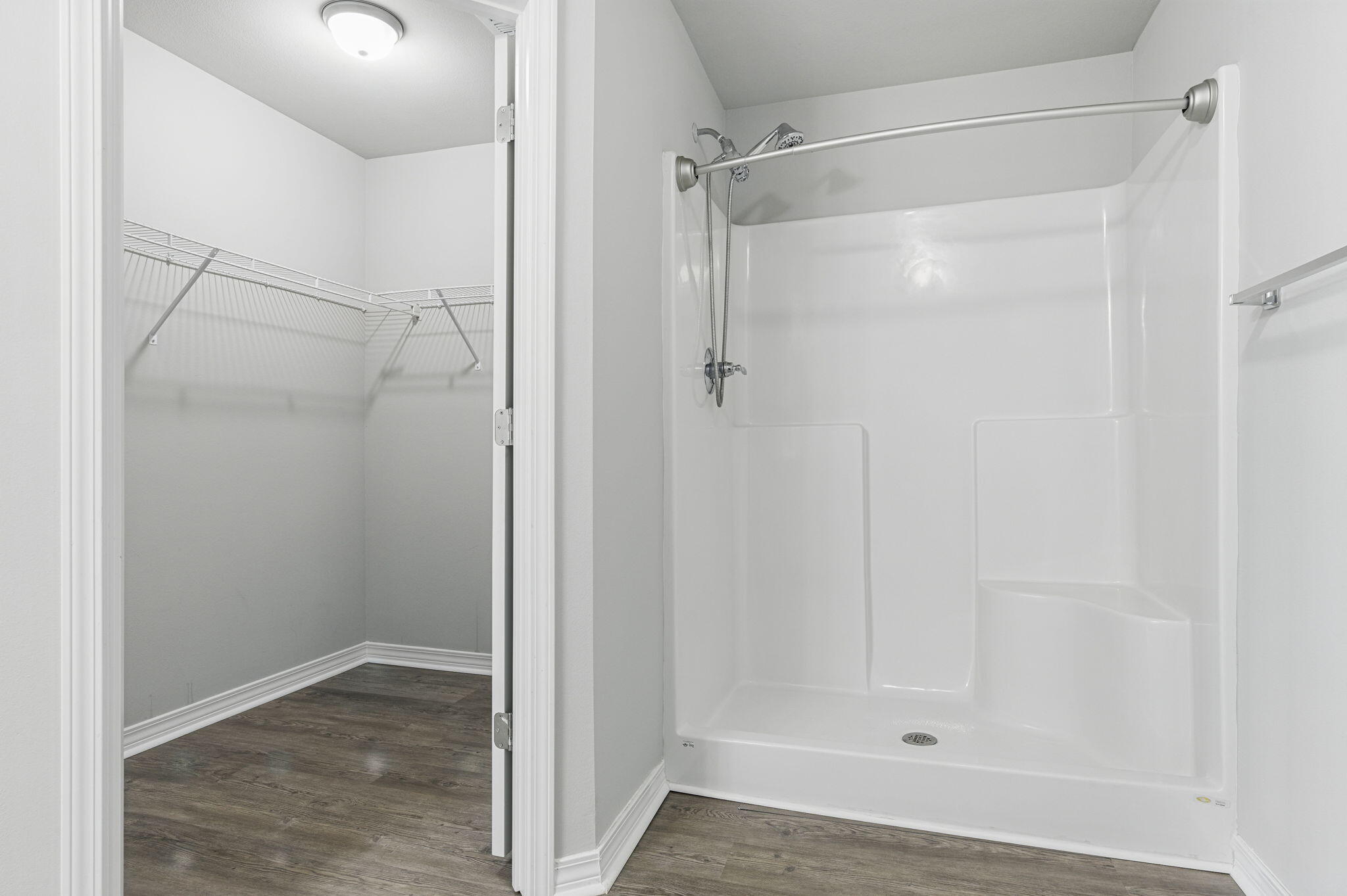 3541 Godwin Road Jay, FL 32565 - Photo 13 of 28 a bathroom with a glass shower door