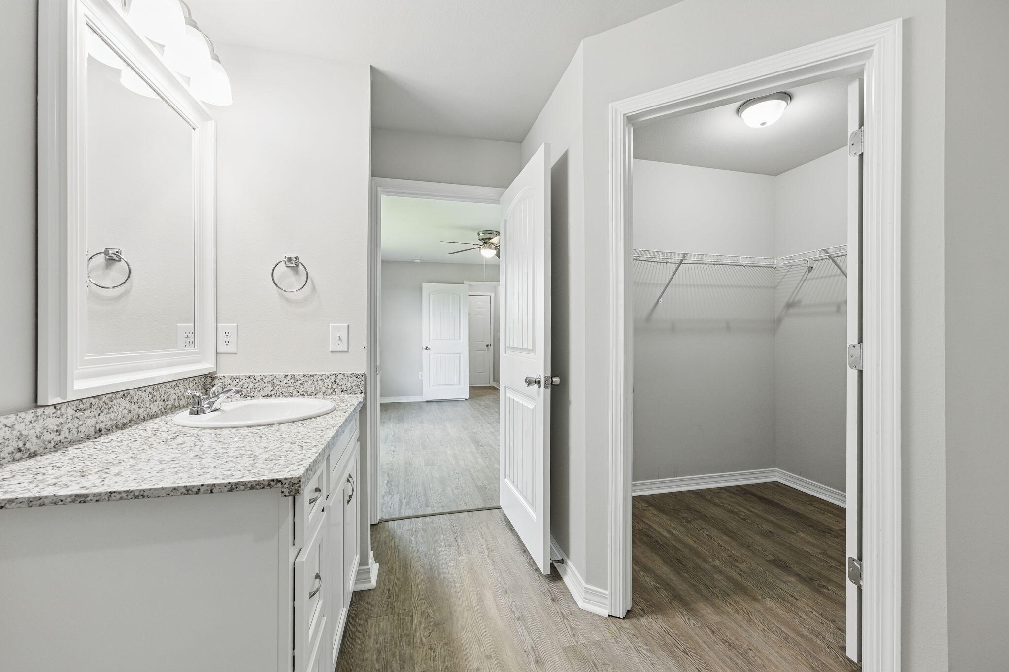 3541 Godwin Road Jay, FL 32565 - Photo 14 of 28 a bathroom with a granite countertop sink and a mirror