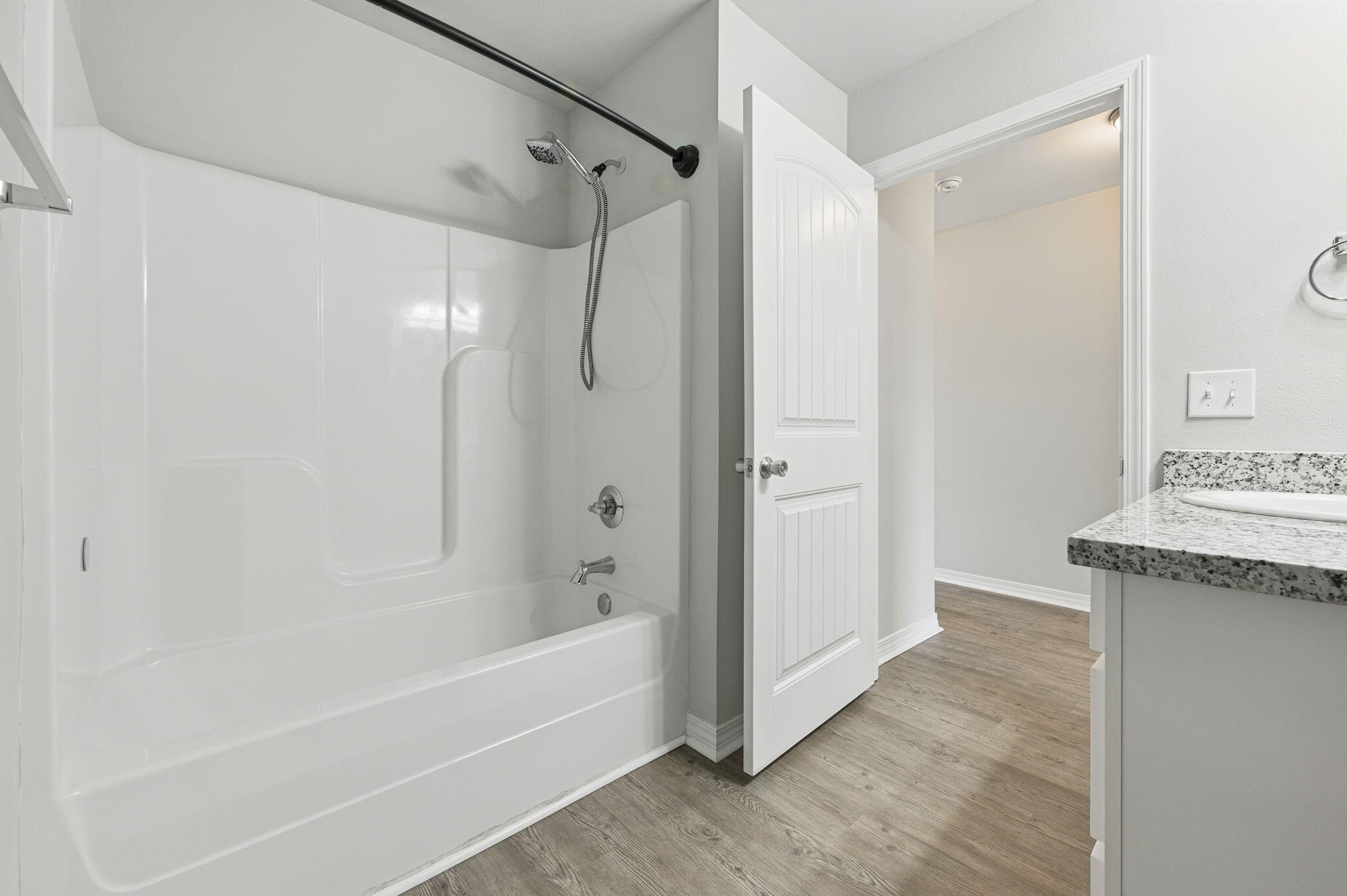 3541 Godwin Road Jay, FL 32565 - Photo 18 of 28 a bathroom with a granite countertop shower and a bathtub