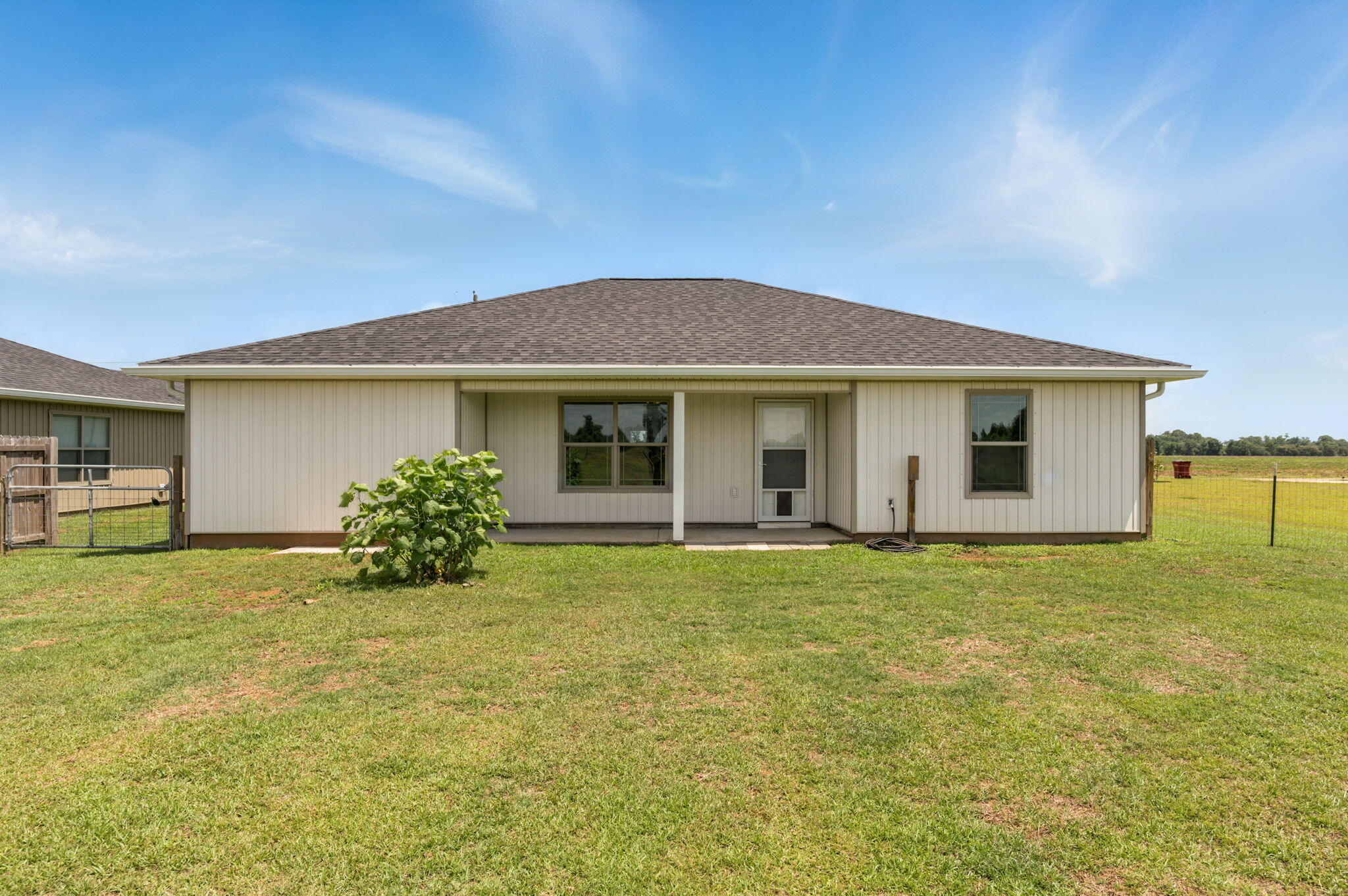 3541 Godwin Road Jay, FL 32565 - Photo 23 of 28 a front view of house with yard and outdoor seating
