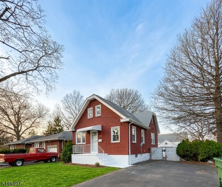 a view of a yard in front of a house