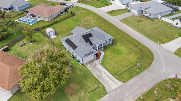 an aerial view of a swimming pool