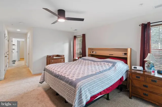 a bedroom with a bed and a closet