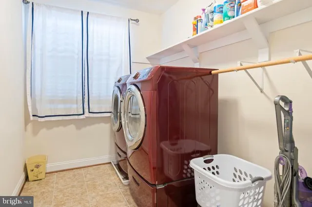 a bathroom with a toilet and a sink