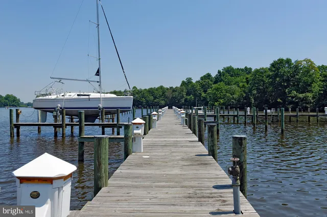 a front view of a house with a lake view