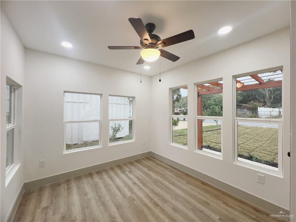604 North 11th Street McAllen, TX 78501 - Photo 14 of 20 a view of an empty room with a window