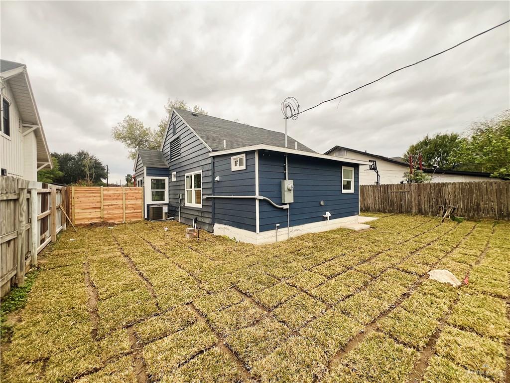 604 North 11th Street McAllen, TX 78501 - Photo 19 of 20 a view of a house with wooden fence