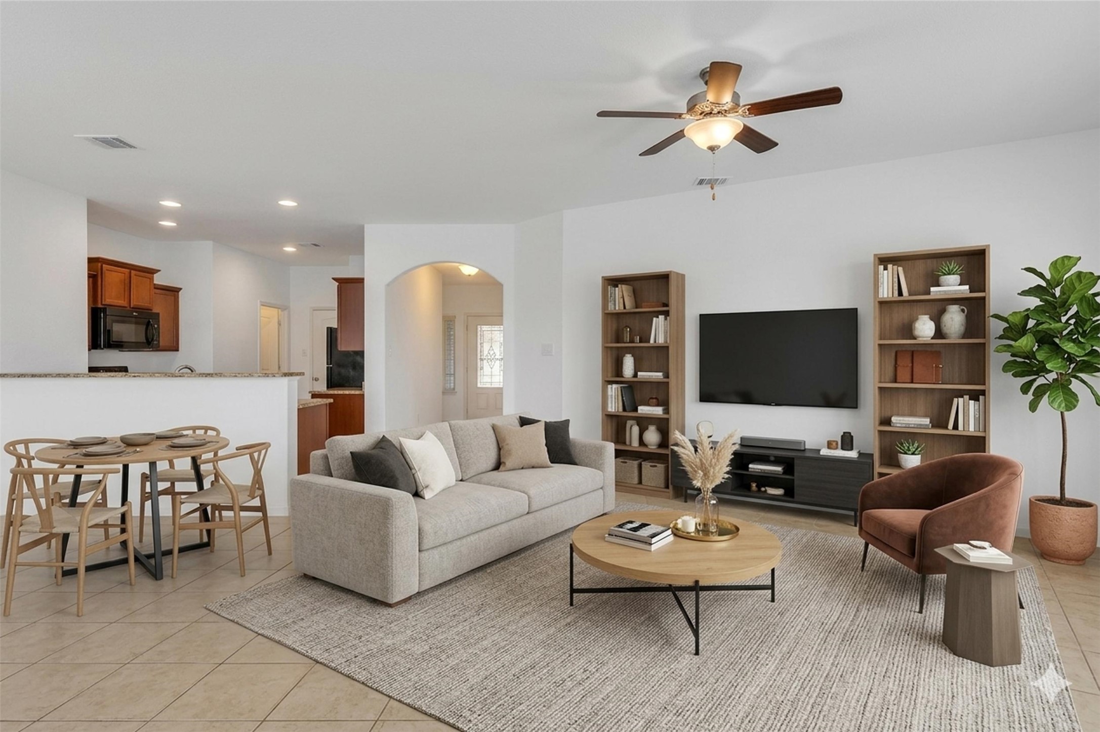 13213 Clara Martin Road Manor, TX 78653 - Photo 17 of 38 Virtually Staged. Living area featuring a ceiling fan, arched walkways, recessed lighting, and light tile patterned floors