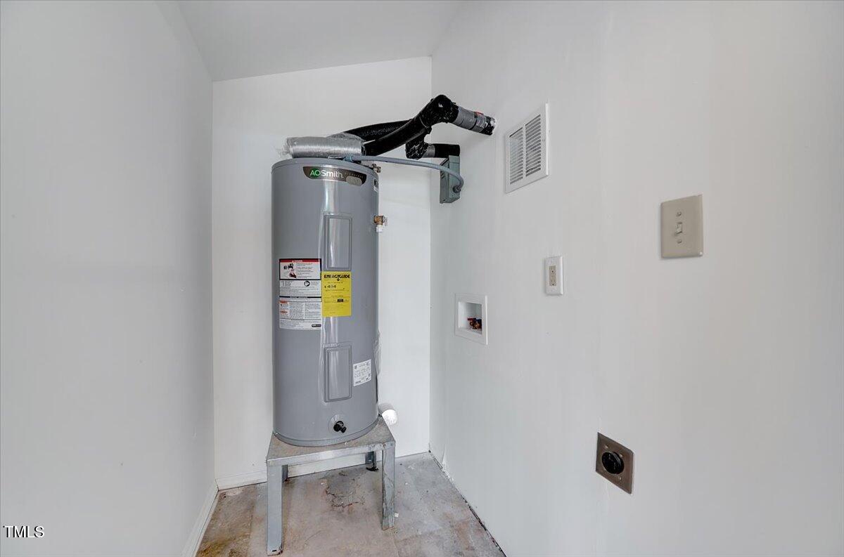 592 Perdues Road Louisburg, NC 27549 - Photo 19 of 27 a view of an entryway with wooden floor