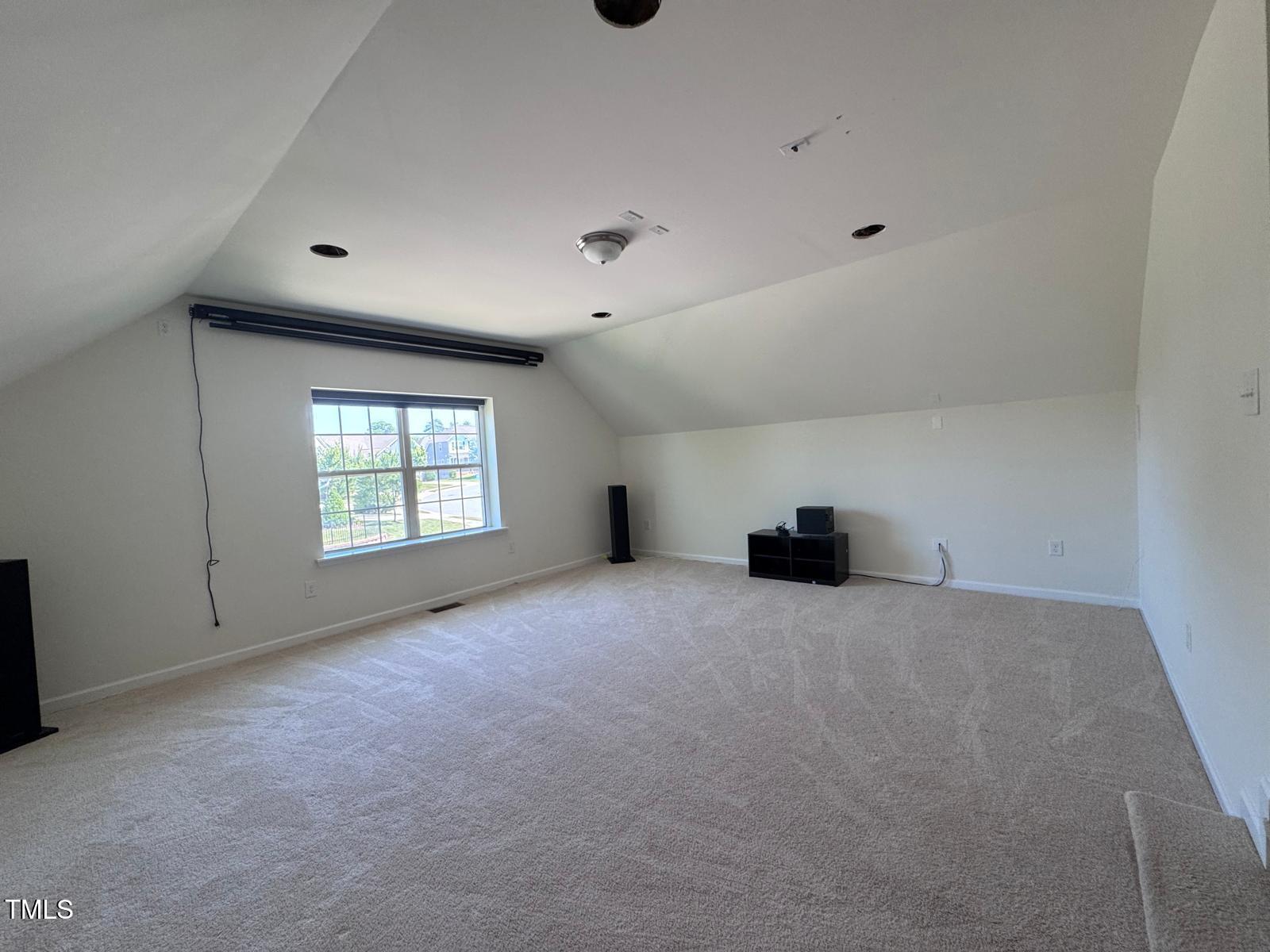 1205 Elliott Ridge Lane Morrisville, NC 27560 - Photo 15 of 32 a view of an empty room with a window