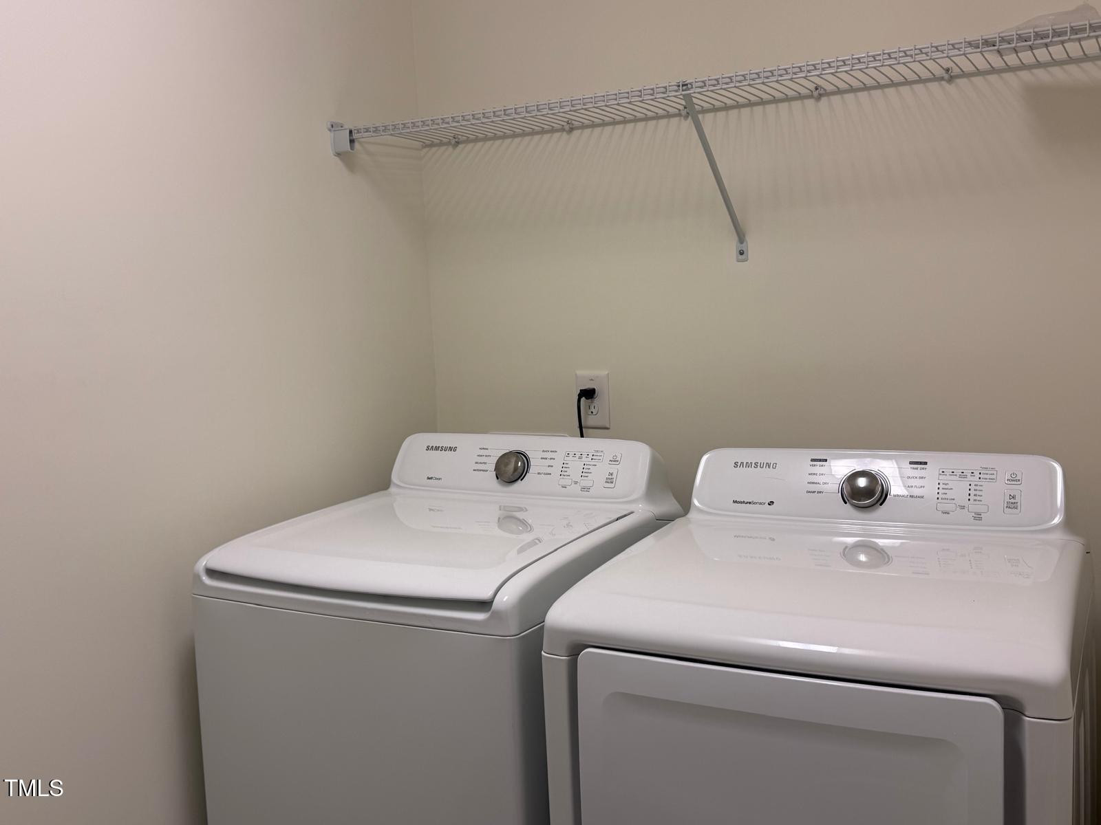 1205 Elliott Ridge Lane Morrisville, NC 27560 - Photo 16 of 32 a utility room with dryer and washer