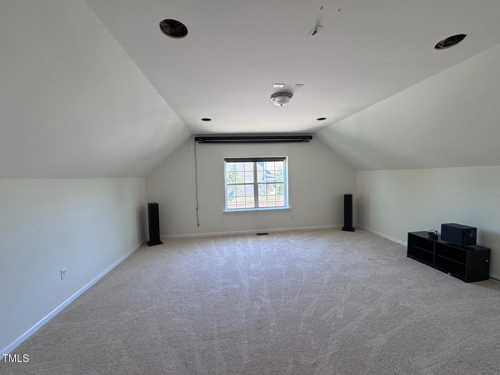 1205 Elliott Ridge Lane Morrisville, NC 27560 - Photo 25 of 32 a view of an empty room with a window
